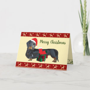 Carte Scène de Noël avec un teckel en Père Noël