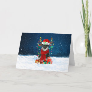 Carte Schnauzer Chien en neige avec cadeaux de Noël