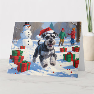 Carte Schnauzer coule en neige avec le Casquette de Noël