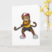 Carte Singe au hockey avec bâton de hockey (Fleur jaune)