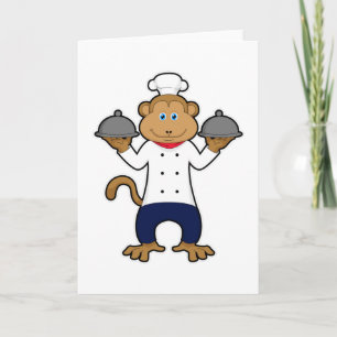 Carte Singe comme cuisinier avec assiettes de service