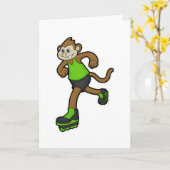 Carte Singe comme patineur avec patins en ligne (Fleur jaune)
