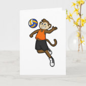Carte Singe en joueur de volley-ball avec ballon de voll (Fleur jaune)