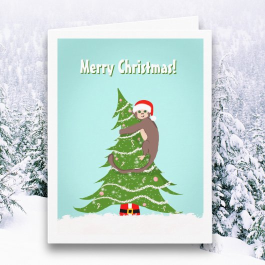 Carte Singe joyeux Noël grimpant à l'arbre