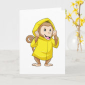 Carte Singe sous la pluie avec imperméable (Fleur jaune)