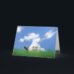 Carte Sister's birthday golf ball in grass<br><div class="desc">White golf ball in green grass with golf club and sky background for sister's birthday.</div>