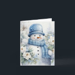 Carte Snowman mignon Casquette & Scarf Snow Arbres couve<br><div class="desc">Adorable bonhomme de neige en bleu casquette et foulard tenant de jolies fleurs blanches en cette journée froide d'hiver.</div>