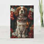 Carte Springer Spaniel avec un cadeau de Noël devant la (Devant)