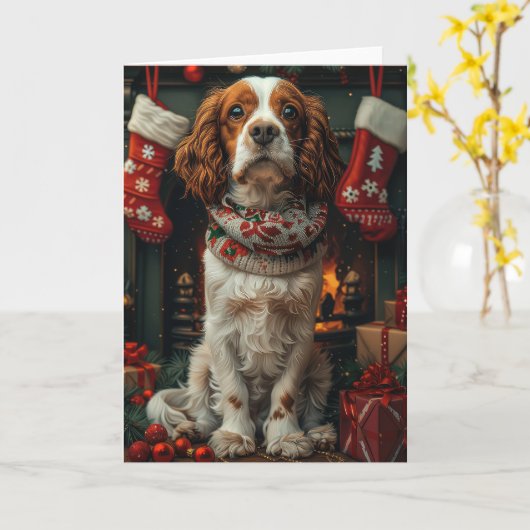 Carte Springer Spaniel avec un cadeau de Noël devant la (Fleur jaune)