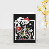 Carte Squelette de Noël avec crâne souriant buvant du ca (Fleur jaune)