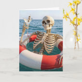 Carte Squelette d'Halloween flottant dans un bouée de sa (Fleur jaune)