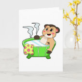 Carte Suricate au bain dans la baignoire (Fleur jaune)