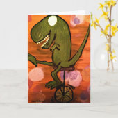 Carte T-Rex conduit un monocycle (Fleur jaune)
