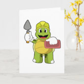 Carte Tortue comme maçon avec pierre (Fleur jaune)