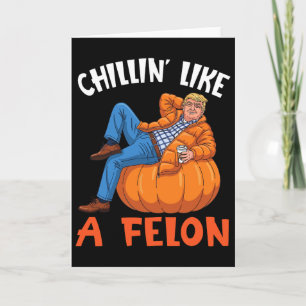 Carte Trump boit du café sur une citrouille en se détend