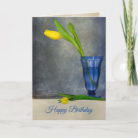 tulipe jaune d'anniversaire dans un verre de sunda