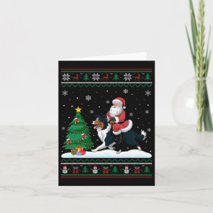 Carte Un arbre de Noël laid éclaire Père Noël équitation