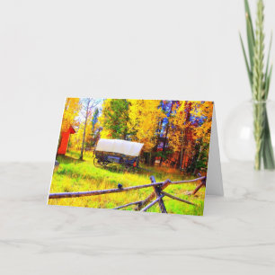Carte Un chariot couvert dans un arrangement d'automne