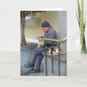 Carte Un homme avec son chat - Lire le journal