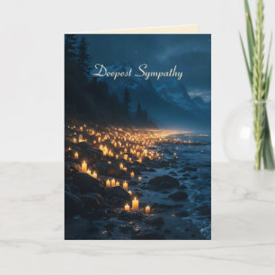 Carte Une mer de lumières de bougies sur la plage dans l