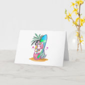 Carte Unicorne avec planche de surf sur la plage (Fleur jaune)