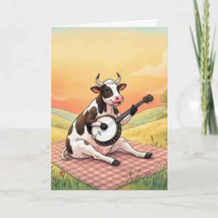 Carte Vache d'anniversaire jouant du banjo sur une couve