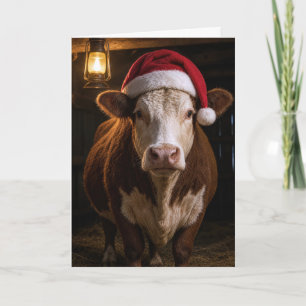 Carte Vache Hereford de Noël dans une grange