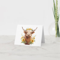 Vache Highland avec Couronne de fleurs de tourneso