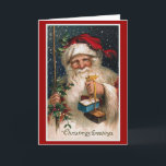 Carte Vintage "voeux de Noël"<br><div class="desc">Carte classique de Noël vintage montrant le Père Noël tenant des cadeaux.</div>