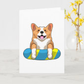 Carte Welsh Corgi à la natation avec planche de natation (Fleur jaune)