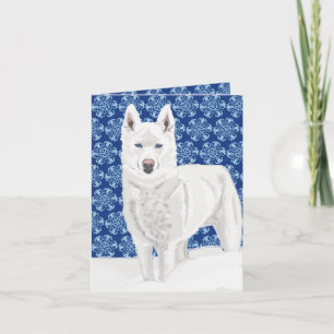 Carte White Husky contre les lacs de neige et le ciel bl