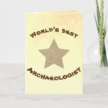 Carte World's Best Archaeologist Golden Star<br><div class="desc">This simple greeting card has the words "World's best archaeologist" in fancy bold "primitive" characters and a big gold star on a "dirty" yellow and orange background. The same colorful sand-like background is repeated inside the card, which is left empty so you can add your personal text or just have...</div>