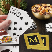Cartes de jeu décorées d'un monogramme jaunes et (In Situ)