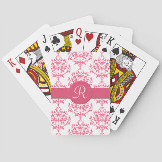 Cartes de jeu roses de monogramme de damassé