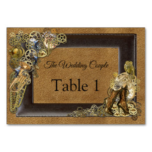 Cartes de mariage Steampunk sur table en daim