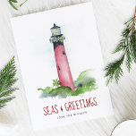 Cartes de Noël de plage Watercolor Lighthouse<br><div class="desc">Célébrez Noël en juillet ou la saison des Fêtes de 2025 avec ces cartes de Noël de plage avec un phare aquarelle peint à la main inspiré par l'emblématique phare Jupiter Inlet en Floride. Cette scène de phare côtier est décorée dans une guirlande festive et jumelée à la salutation nautique...</div>