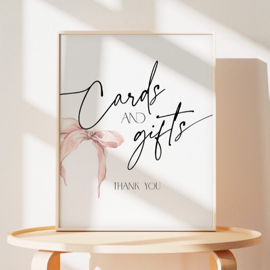 Cartes et Cadeaux signe avec l'arc rose vif
