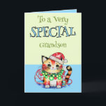 Cartes Pour Fêtes Annuelles À un petit-fils très spécial à Noël bleu<br><div class="desc">Carte de Noël "To a Very Special Grandson" Carte de Noël charmante avec un adorable chat portant un chapeau de Père Noël festif. Le design chaleureux et douillet fera de lui un sourire en cette période de fêtes. Bleu/Vert</div>