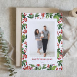 Cartes Pour Fêtes Annuelles Aquarelle Festive Verdure et Winterberry Photo<br><div class="desc">Joyeuses fêtes ! Envoyez des souhaits saisonniers chaleureux avec notre carte de vacances photo personnalisable, avec une belle aquarelle design de baies rouges d'hiver et de verdure luxuriante. Personnalisez avec votre photo préférée et un message personnalisé pour créer un accueil de vacances unique qui sera sûr d'égayer la saison pour...</div>