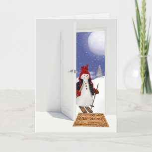 Cartes Pour Fêtes Annuelles Bonhomme de neige de Noël sur des skis dans l'enca
