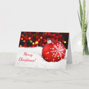 Cartes Pour Fêtes Annuelles Boule rouge décorative de Noël dans la neige