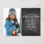 Cartes Pour Fêtes Annuelles Chalkboard voeux de Noël<br><div class="desc">Les salutations de vacances sont affichées sur cette carte postale unique de style tableau noir Noël et Nouvel An. La typographie qui ressemble à de la craie sur un tableau noir est disposée sous une bannière pour envoyer votre meilleur. Ajoutez simplement votre propre photo à gauche. Customisez avec votre(s) nom(s)...</div>