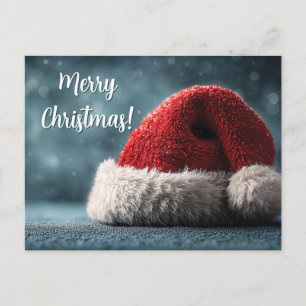 Cartes Pour Fêtes Annuelles Chapeau de Père Noël reposant sur une surface enne