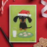 Cartes Pour Fêtes Annuelles Chien drôle Père Noël de teckel avec du lait et<br><div class="desc">Illustration drôle d'art d'un noir et d'un teckel bronzage utilisant un casquette de Père Noël et se reposant devant un verre de lait et d'un plat des biscuits givrés de vacances. Le texte intérieur lit du "des souhaits plus Joyeux Noël." Ce texte peut être personnalisé avec votre propre salutation faite...</div>