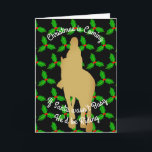 Cartes Pour Fêtes Annuelles Christmas Santa Would be Riding<br><div class="desc">Le principal élément du design est une personne riding a horse in golden silhouette set against a background of repeating holly leaves on black. The default tag-line reads,  "Christmas is Coming. If Santa Wasn't Busy He'd Be Riding" All greetings texts can easily be replaced with preferred phrases if desired.</div>