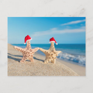 Cartes Pour Fêtes Annuelles Couple de Sea Stars à Santa Hats Walking At Beach