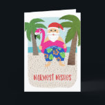 Cartes Pour Fêtes Annuelles Cute Funny Tropical Santa Christmas<br><div class="desc">Cette adorable carte de vacances présente une Père Noël tropicale dessinée à la main, portant des maillots de bain colorés et un flotteur fuchsia flamingo ! D'autres détails amusants comprennent des palmiers, l'océan et une plage de sable. Facile à customiser avec votre propre texte à l'avant et à l'intérieur de...</div>