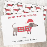Cartes Pour Fêtes Annuelles Dachshund Dog dans le Père Noël amusant<br><div class="desc">Mignonne et adorable Dachshund Sausage ou Wiener chien dans un pull tricoté rouge et blanc festif. Modifiez les noms et le message d'accueil pour personnaliser. Art original de Nic Squirrell.</div>