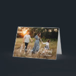 Cartes Pour Fêtes Annuelles Décontracté Script Photo moderne Noël<br><div class="desc">Carte de Noël photo moderne avec un design simple et minimal avec l'accueil "Joyeux Noël" dans un élégant script blanc avec votre nom de famille. L'intérieur a un collage photo composé de six photos carrés.</div>