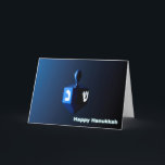 Cartes Pour Fêtes Annuelles Dreidel bleu brillant<br><div class="desc">Un rêve moderniste,  métallique,  bleu contre un arrière - plan sombre et nocturne. Deux des lettres hébraïques trouvées sur un dreidel,  une nonne et un shin,  brillent brillamment. Le texte "Happy Hanoukka" apparaît également en bleu et blanc brillant.</div>
